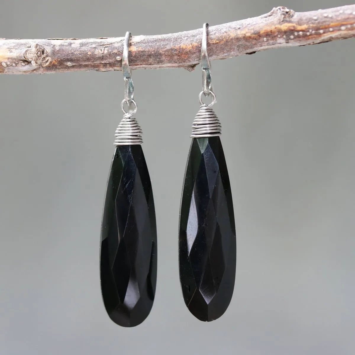 Black onyx teardrop faceted earrings with silver wire wrapped on oxidized sterling silver hooks style