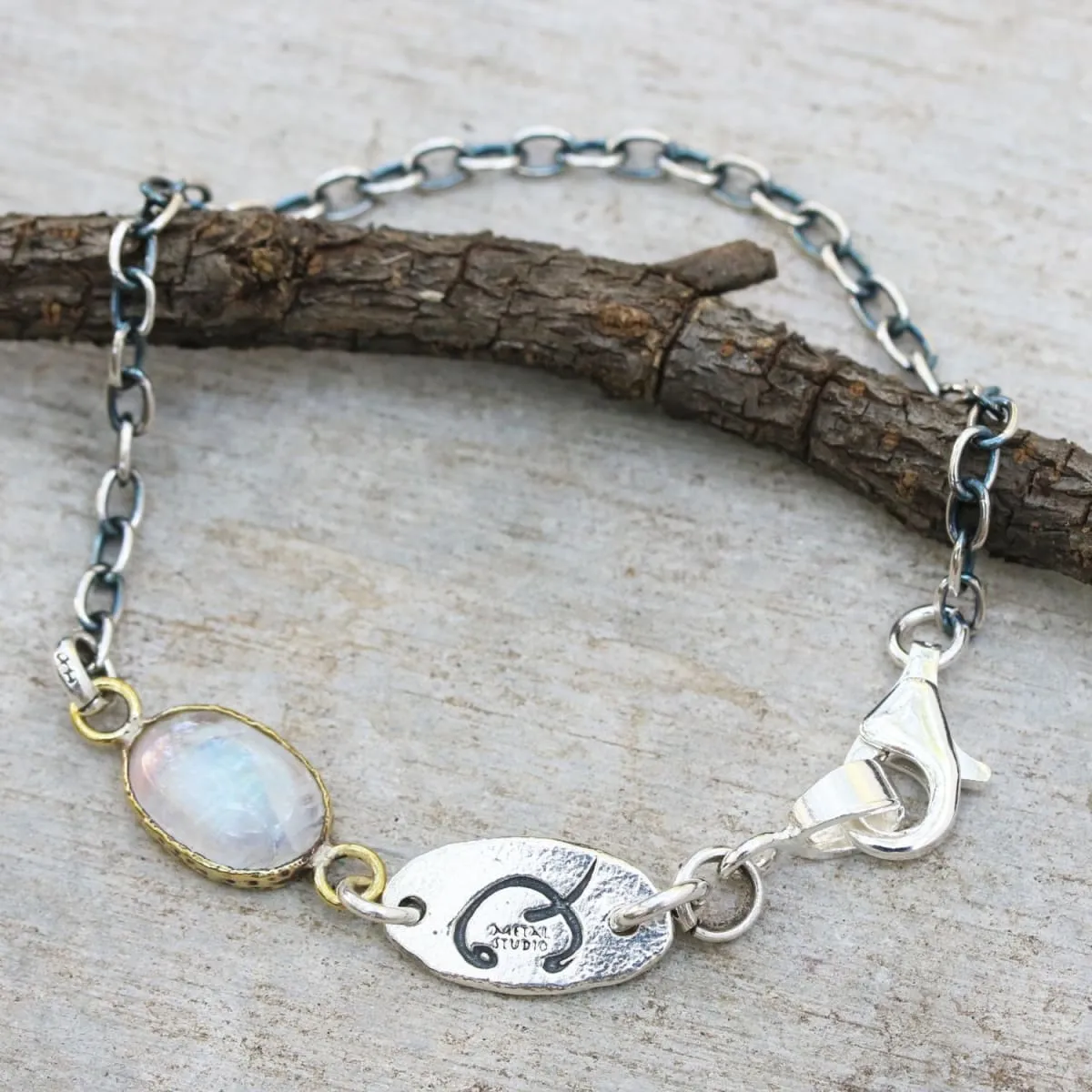 Bracelet oval cabochon moonstone in brass bezel setting and oxidized sterling silver chain