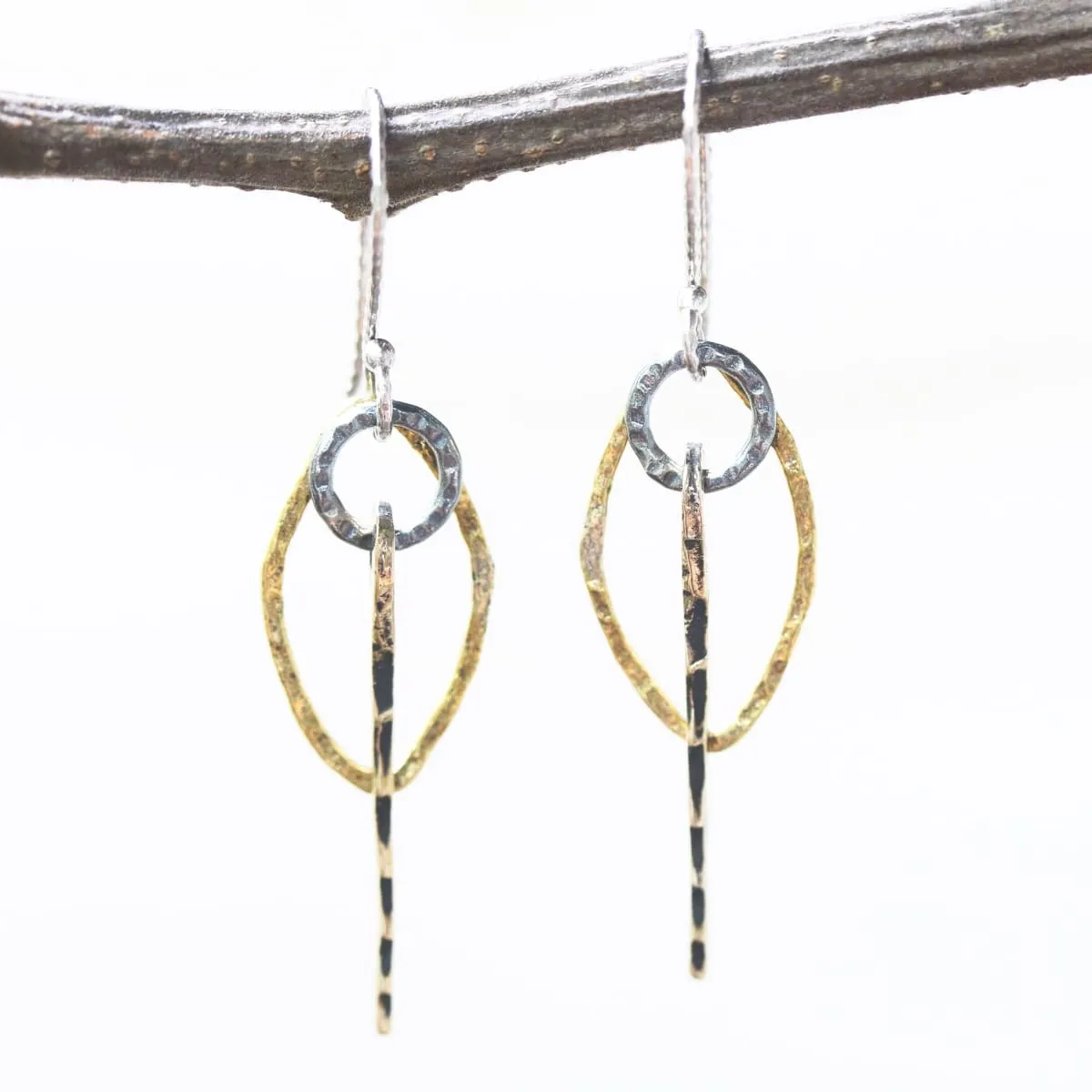 Brass Marquis shape earrings with silver circle and brass sticks on oxidized sterling silver hooks