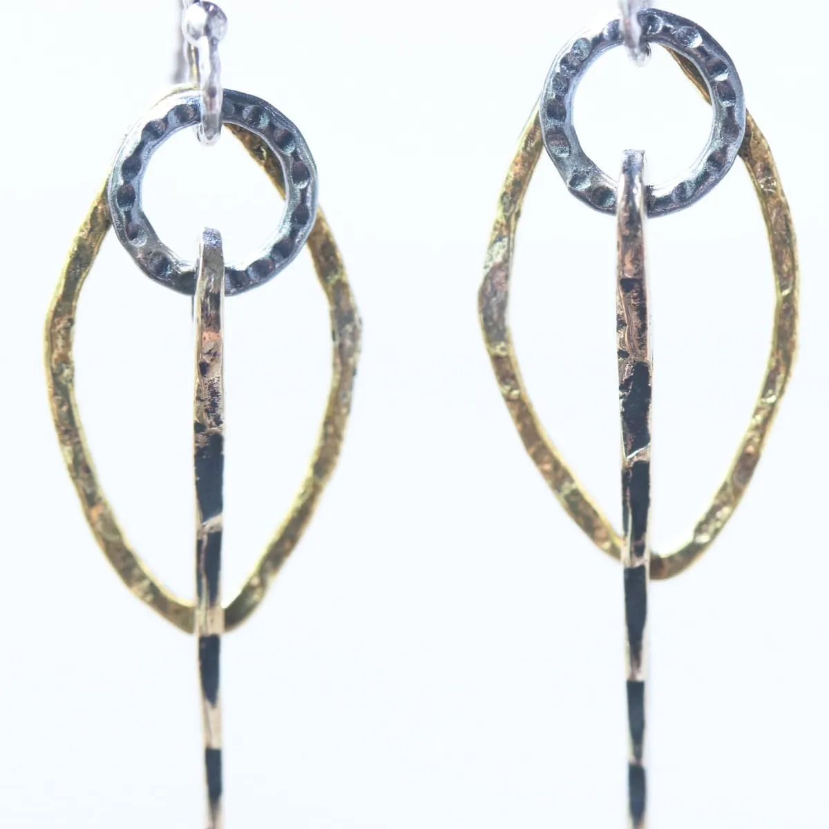 Brass Marquis shape earrings with silver circle and brass sticks on oxidized sterling silver hooks